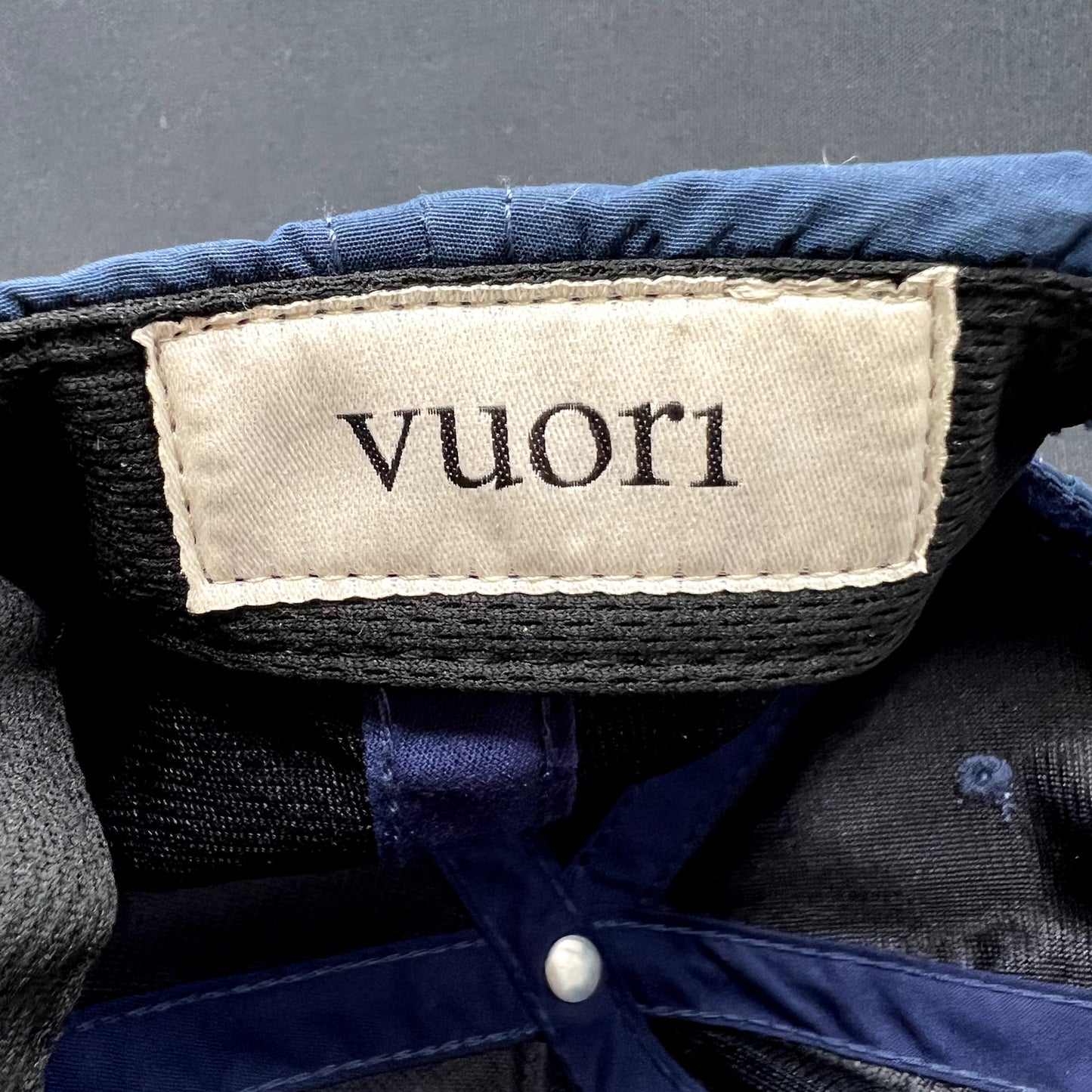 Vuori Investment In Happiness Navy Snapback Performance Hat