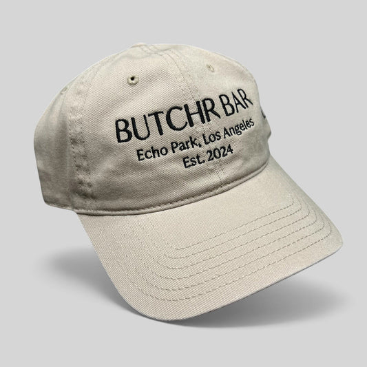 Raree Finds beige cotton twill strapback hat with black Butchr Bar Echo Park Los Angeles embroidery