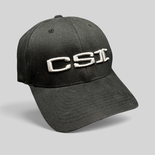 Raree Finds black Yupoong Flexfit cap with raised white CSI embroidery on the front, production staff crew hat