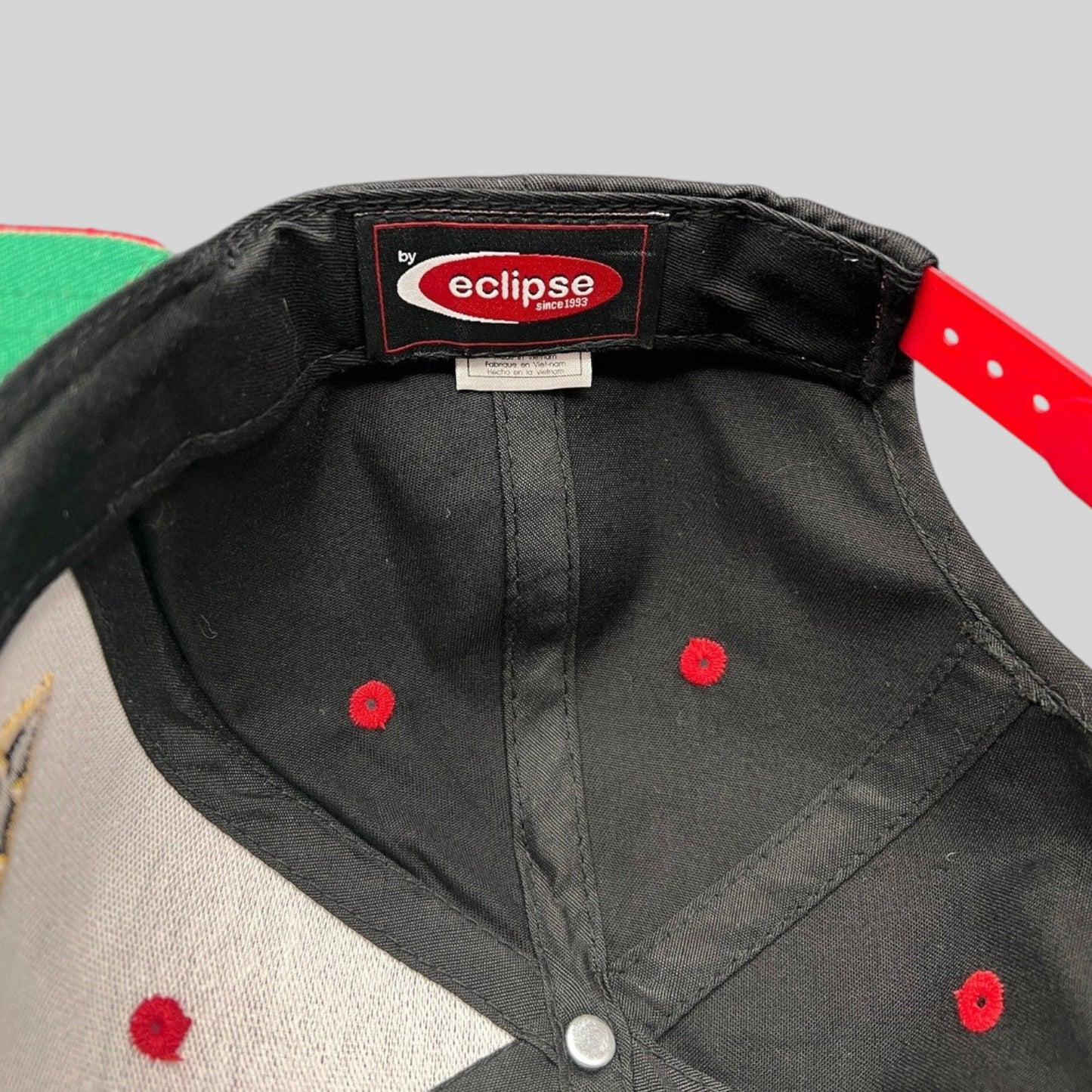 Raree Finds vintage Eclipse snapback hat interior with black cotton lining, red eyelets, and brand label