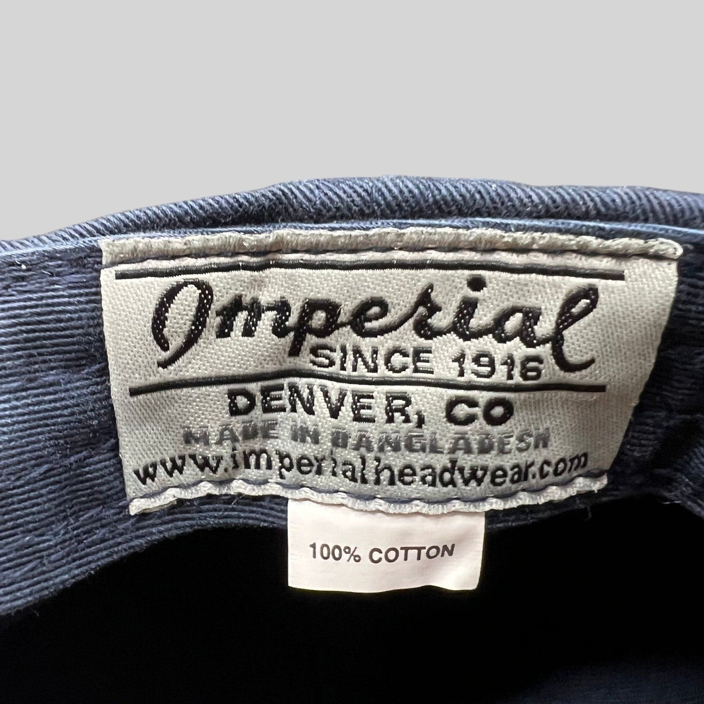 Raree Finds vintage Imperial Headwear cotton hat interior label with brand logo and 100 percent cotton tag