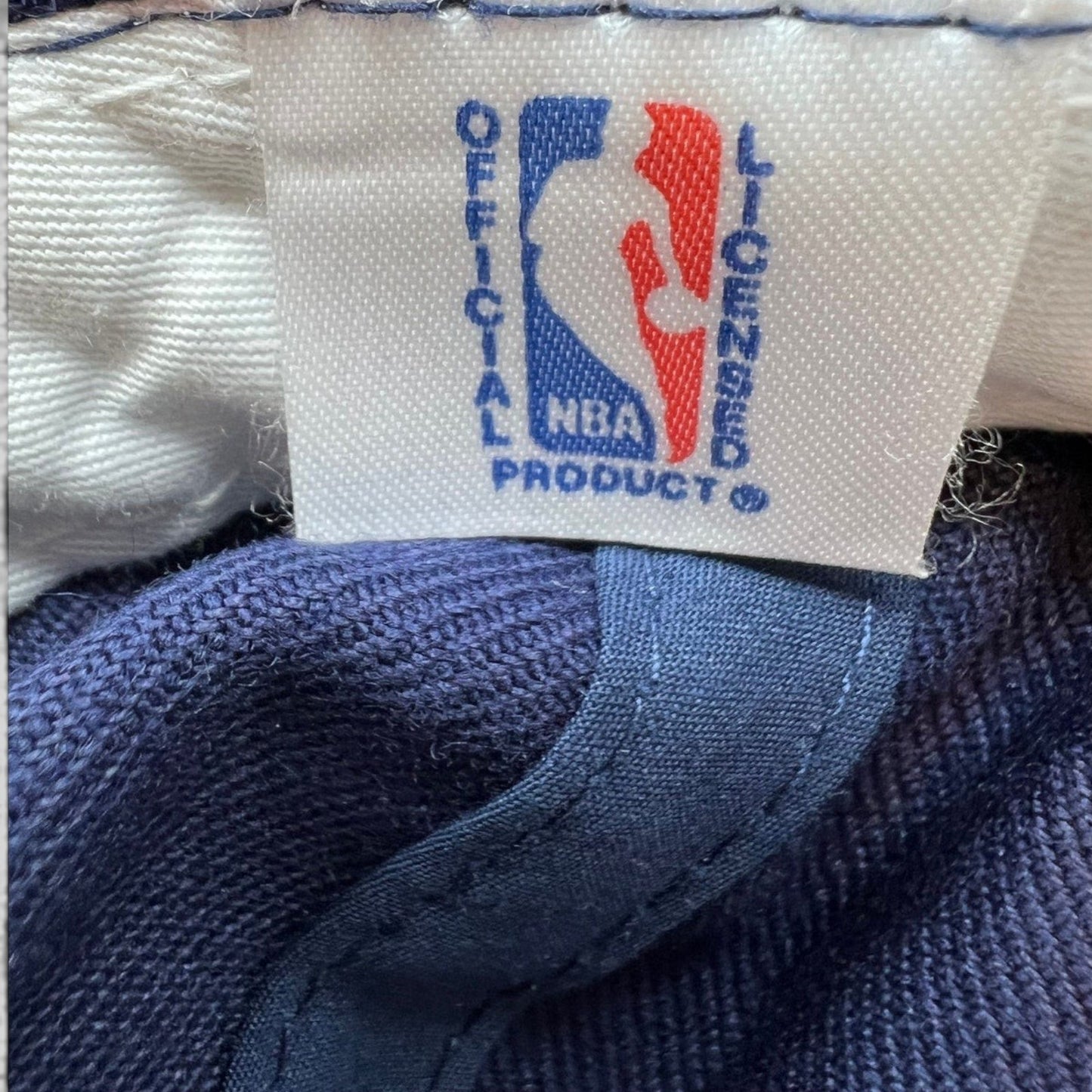 Raree Finds vintage 1990s Houston Rockets hat interior tag featuring the official NBA licensed product logo