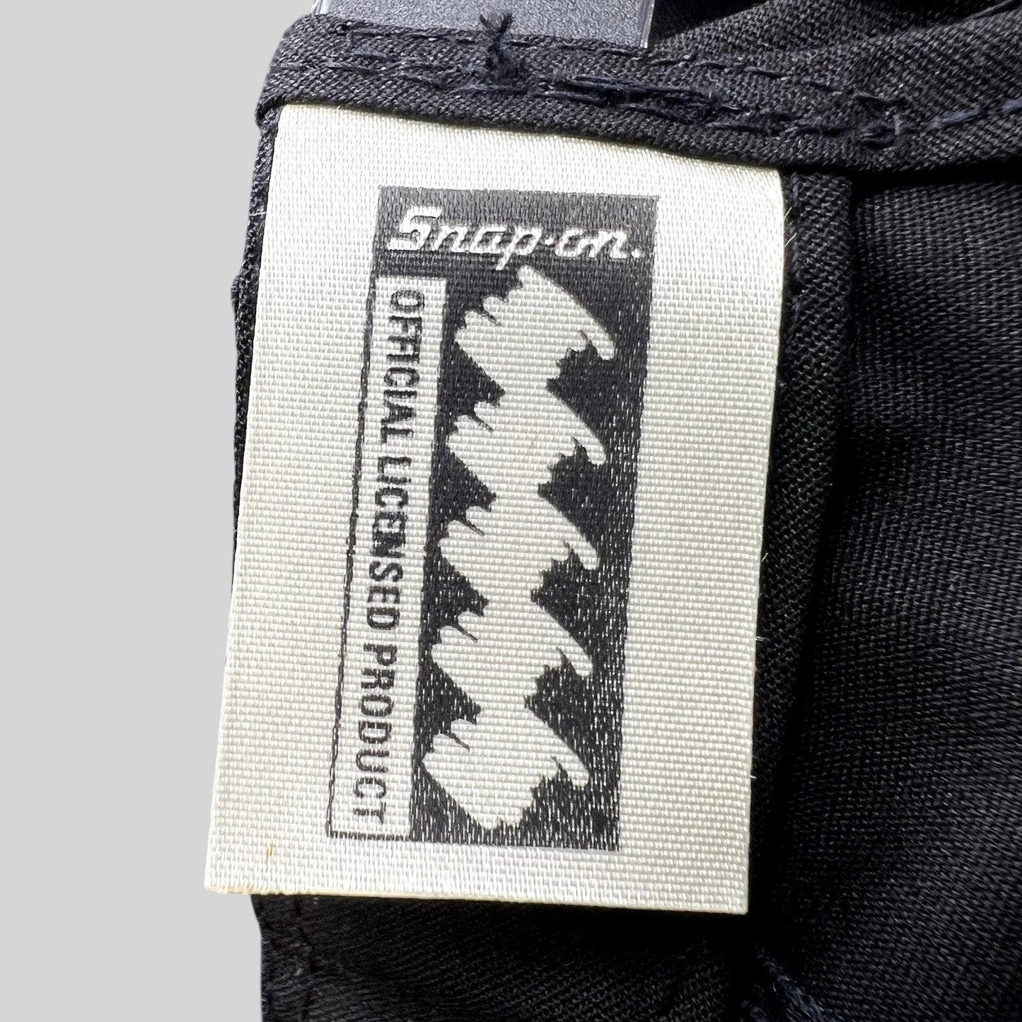 Raree Finds vintage Snap-on Tools official licensed product fabric tag sewn inside a black 90s snapback hat