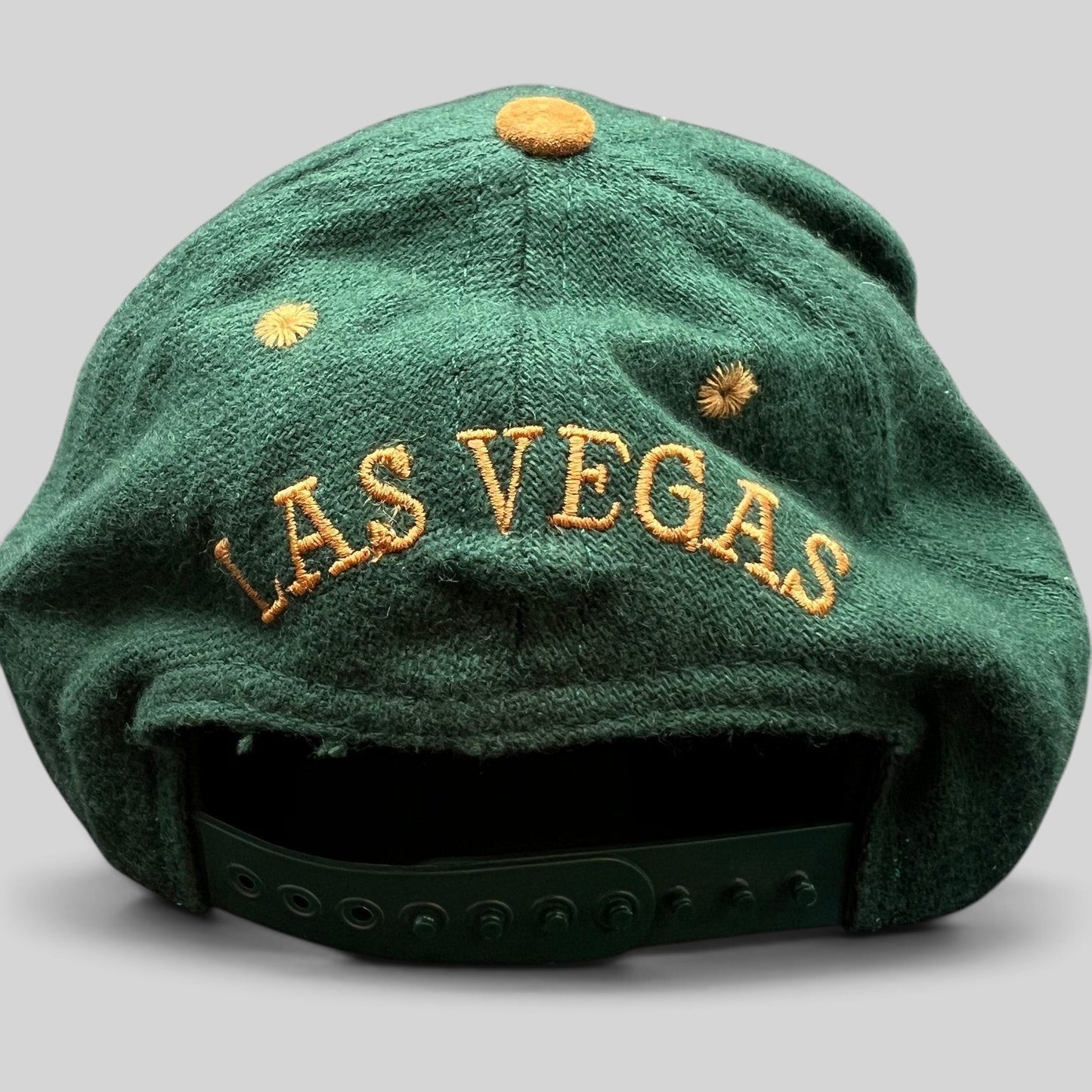 Raree Finds vintage green wool snapback hat with Las Vegas embroidered on the back and tan suede button detail