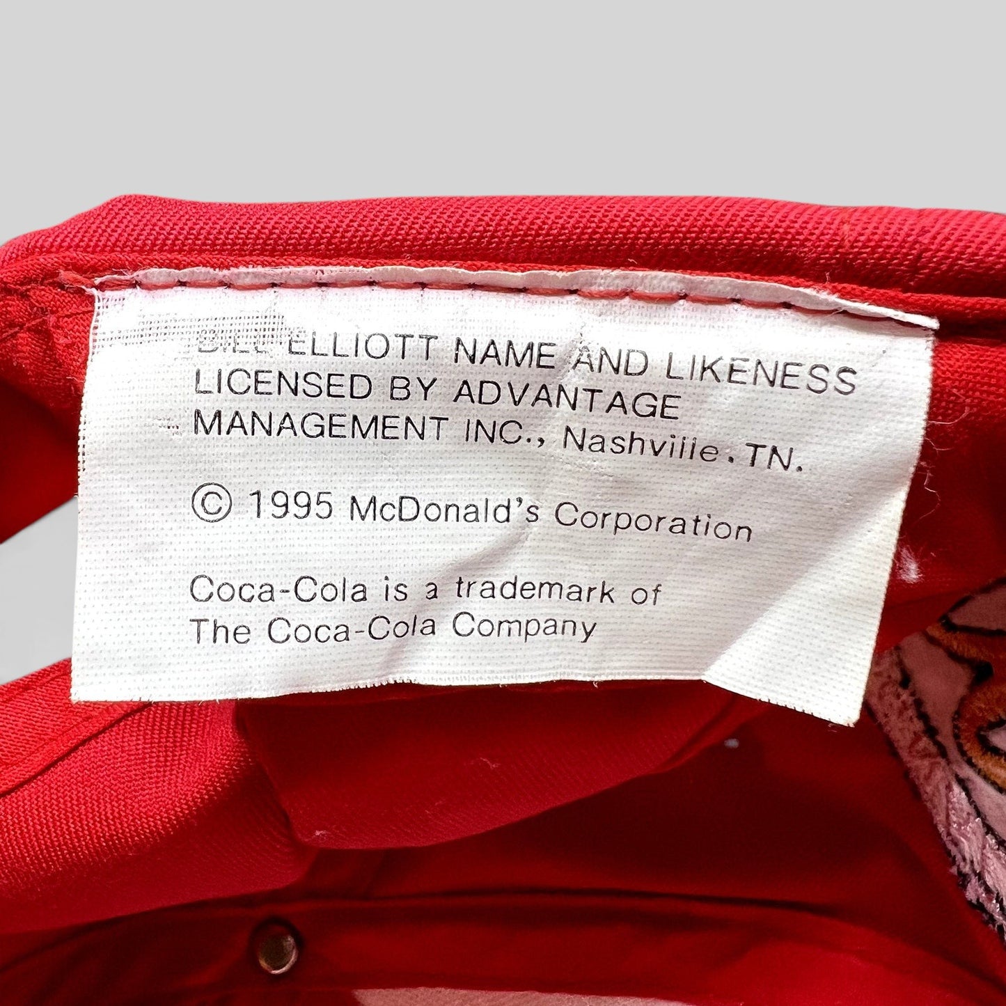 Raree Finds vintage 1995 Bill Elliott NASCAR hat interior tag with McDonald’s Corporation copyright information