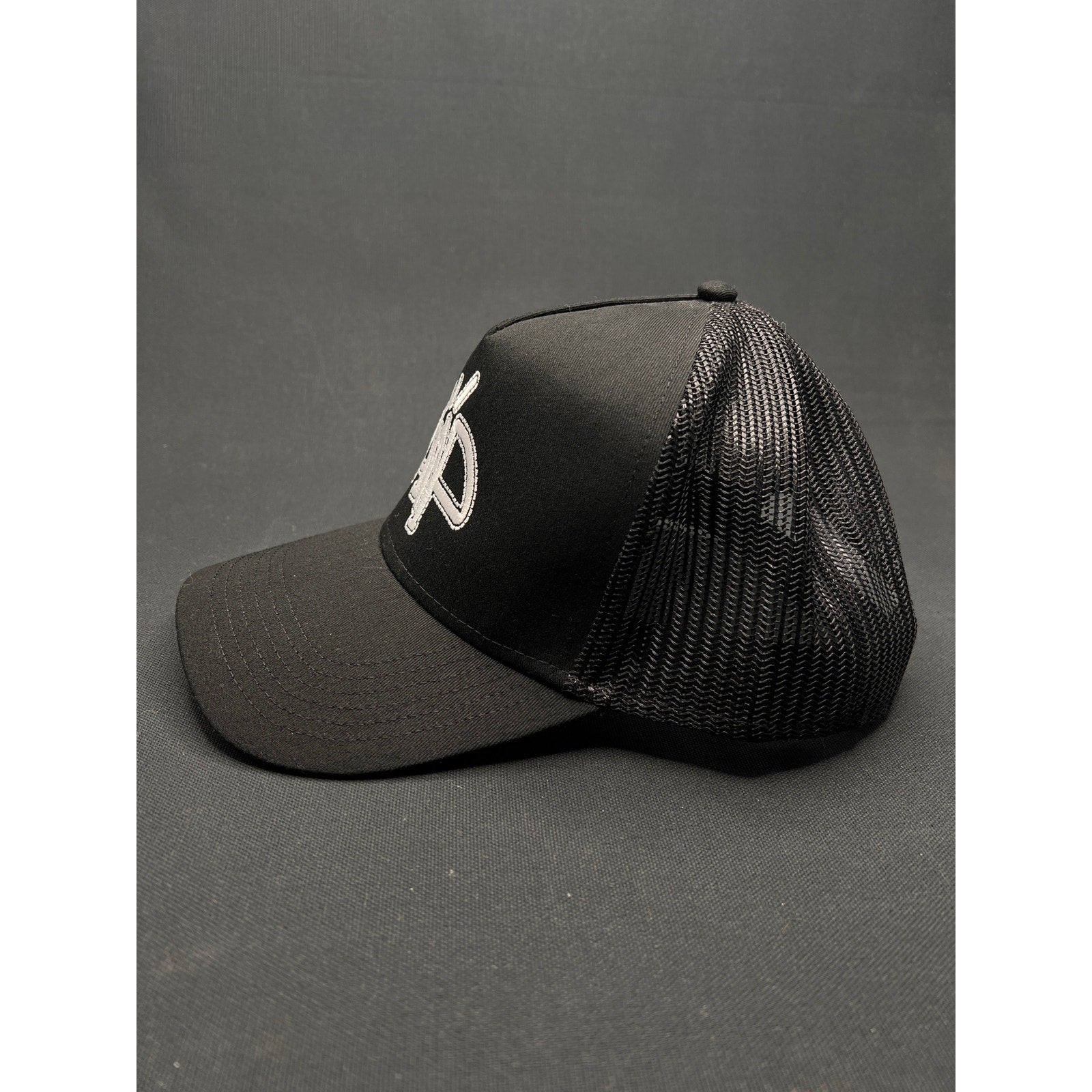 AMP Logo Black Mesh Trucker Hat – Adjustable Snapback