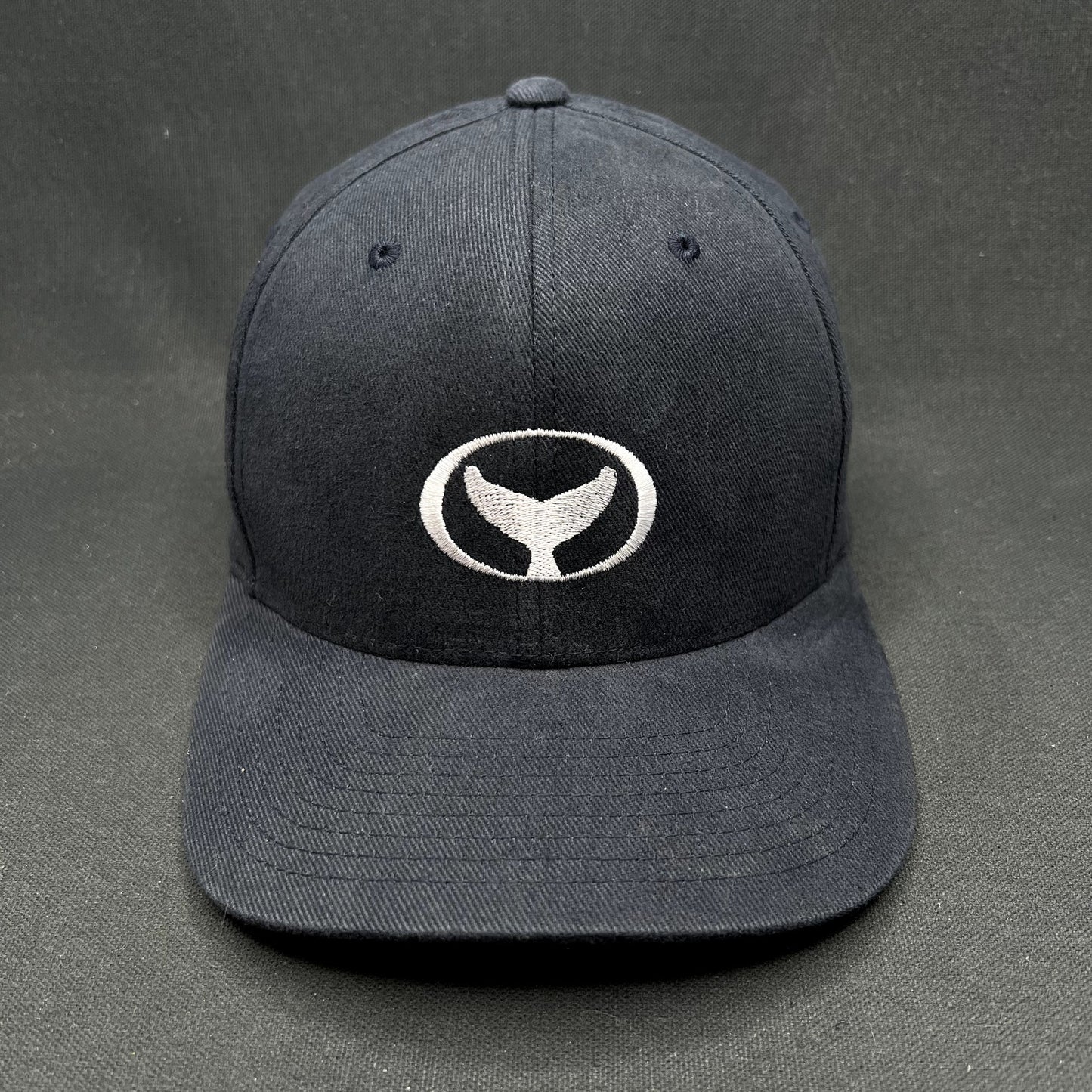 Wyland Galleries Flexfit Hat S/M Black Yupoong Whale Logo Cap