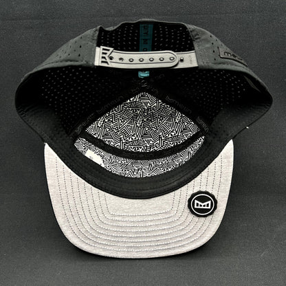 Melin Trenches Hydro Black Snapback Hat Water Resistant Performance Cap