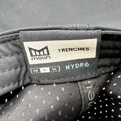 Melin Trenches Hydro Black Snapback Hat Water Resistant Performance Cap