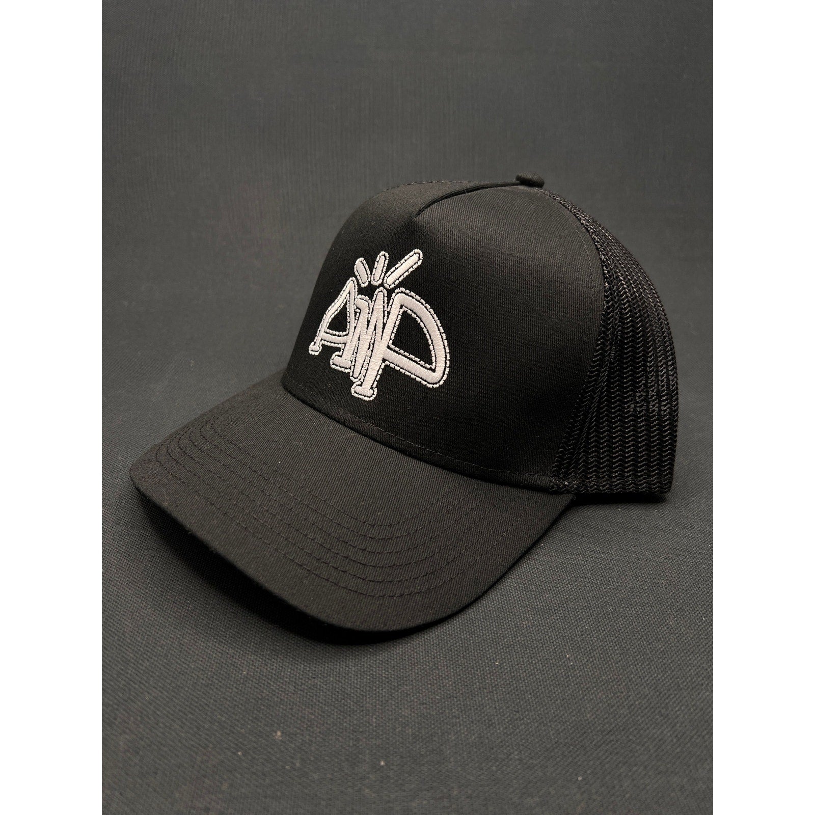 AMP Logo Black Mesh Trucker Hat – Adjustable Snapback