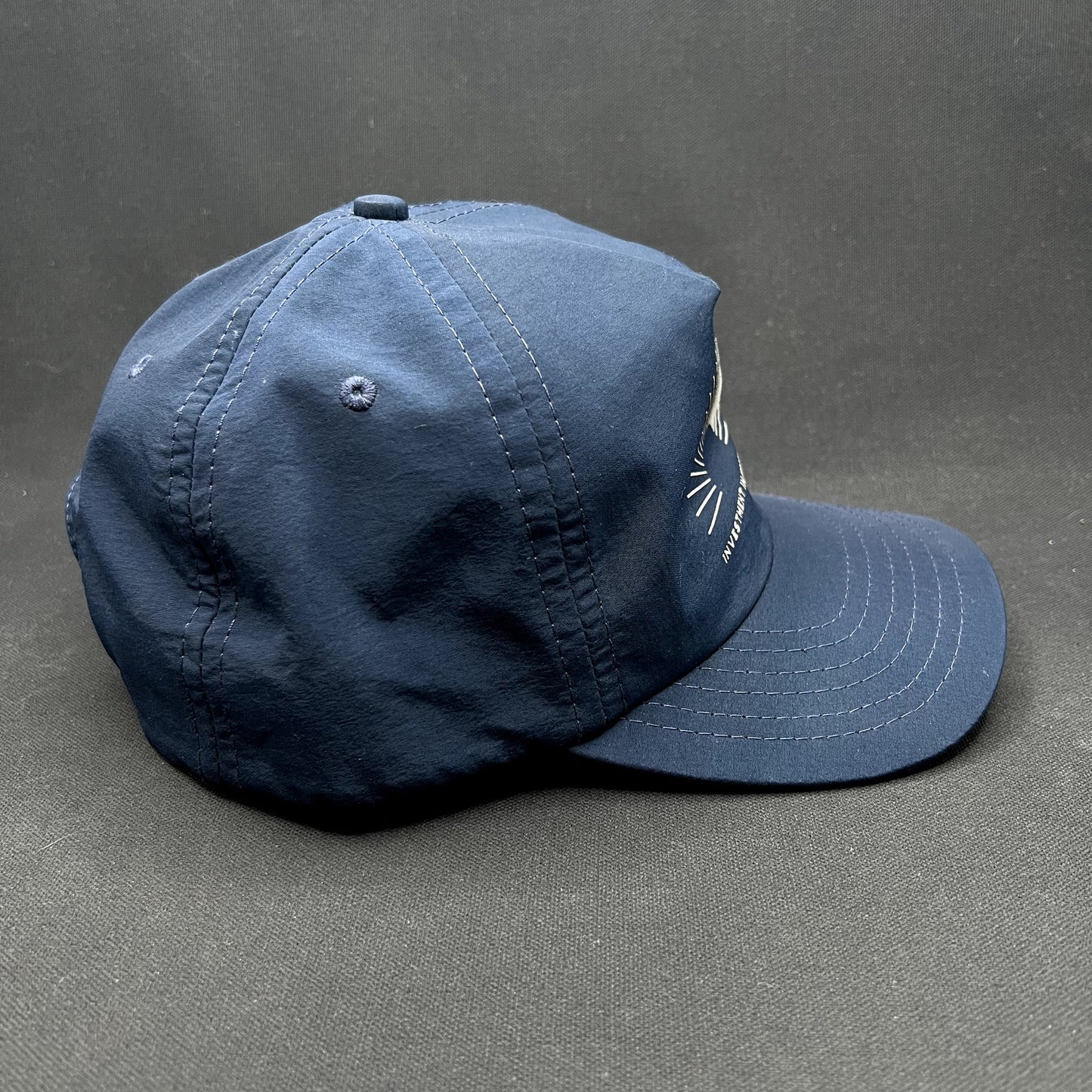 Vuori Investment In Happiness Navy Snapback Performance Hat