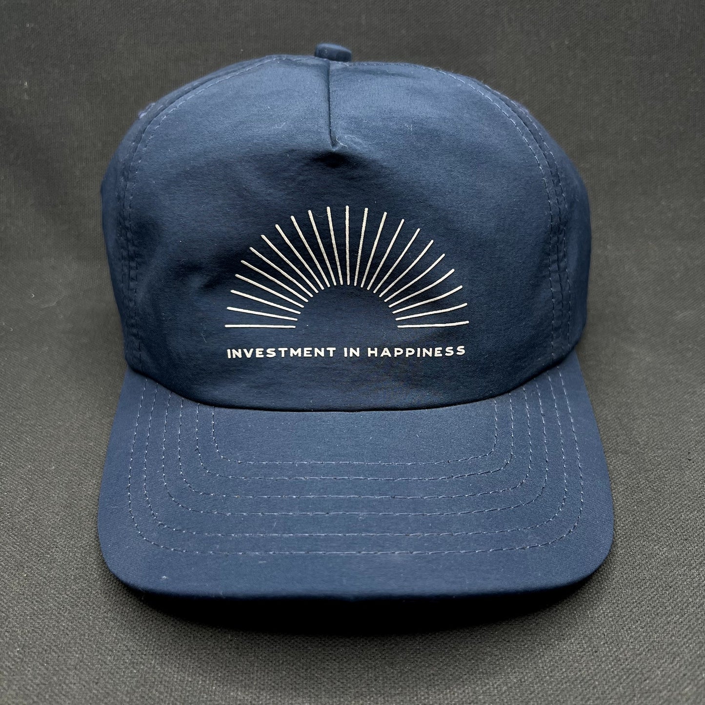 Vuori Investment In Happiness Navy Snapback Performance Hat