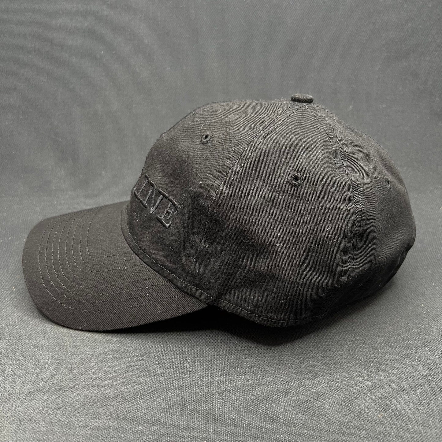 New Era 9TWENTY “Deadline” Black Strapback Hat Tonal Logo