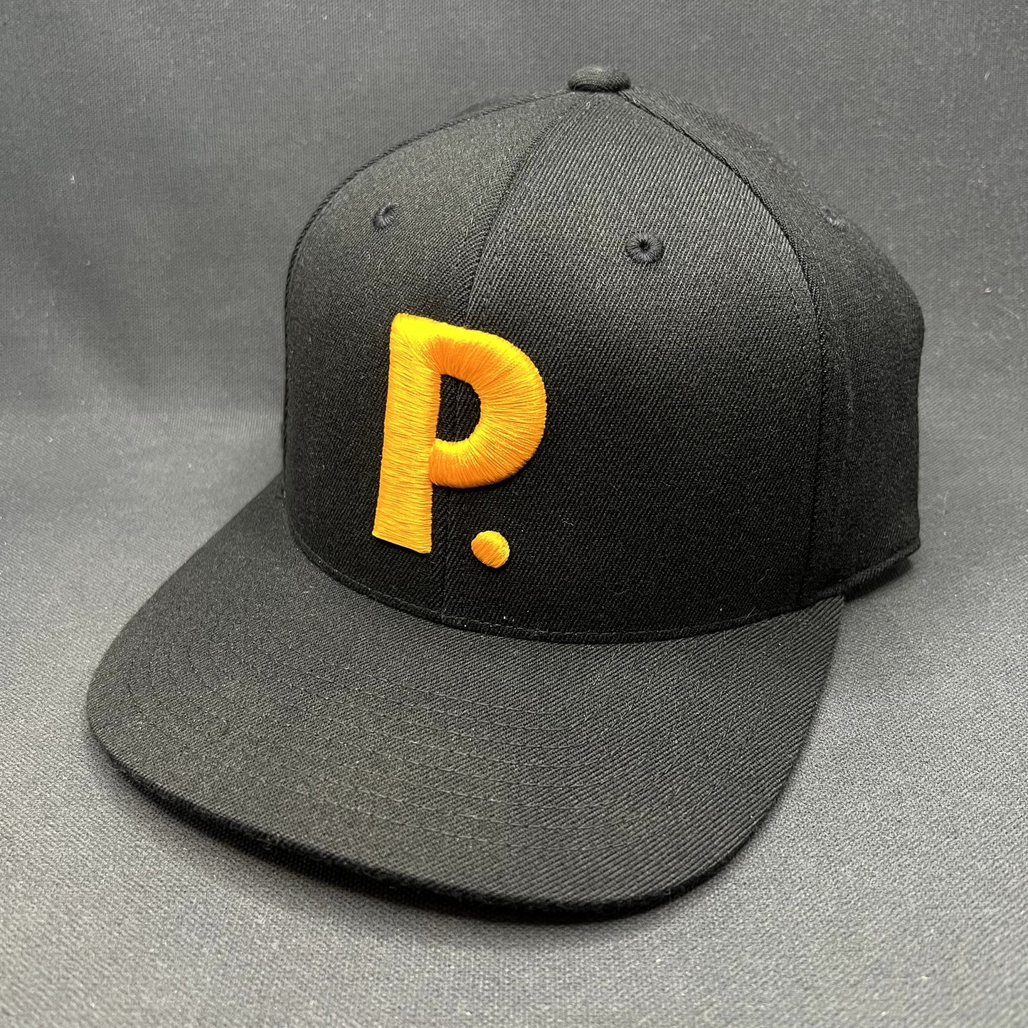 Postino Restaurant Logo Snapback Hat Black Gold Yupoong 110 Flexfit