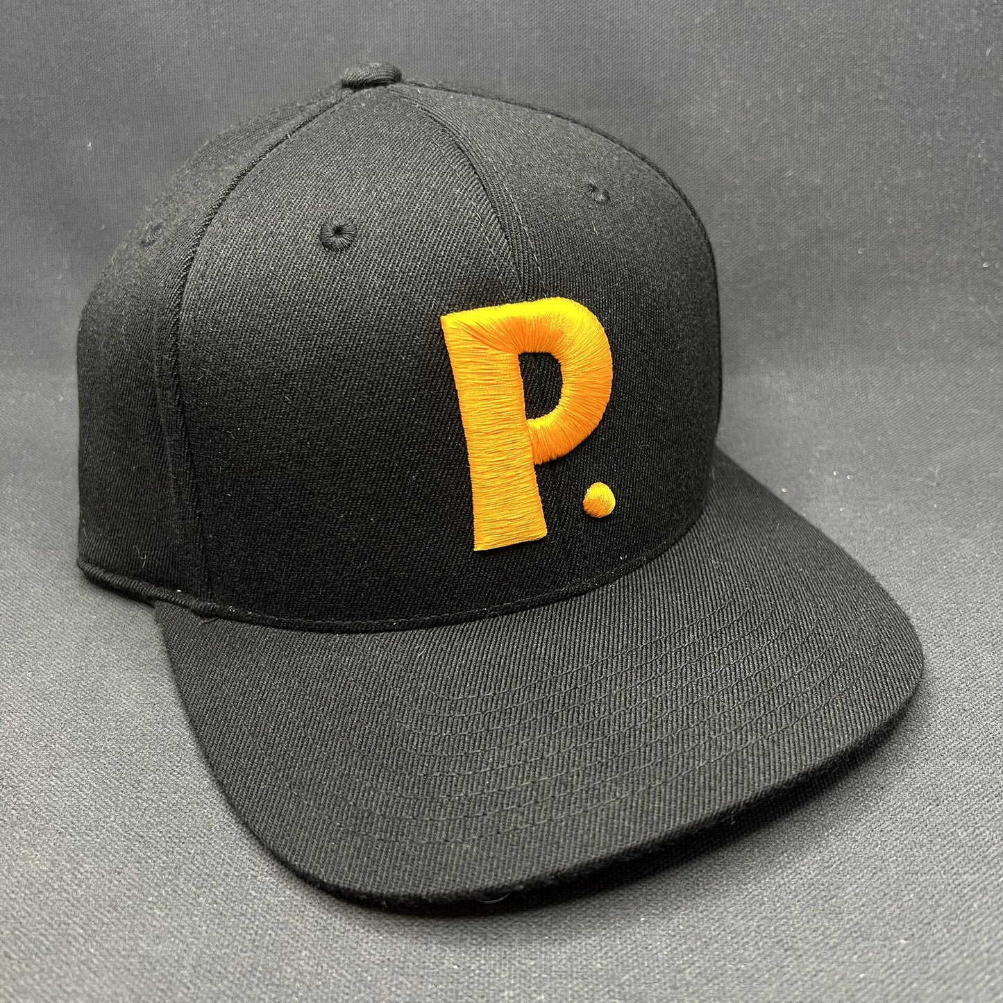 Postino Restaurant Logo Snapback Hat Black Gold Yupoong 110 Flexfit