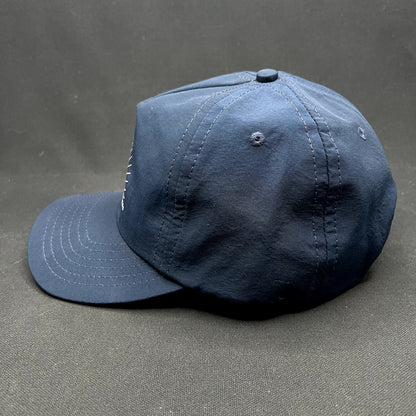 Vuori Investment In Happiness Navy Snapback Performance Hat