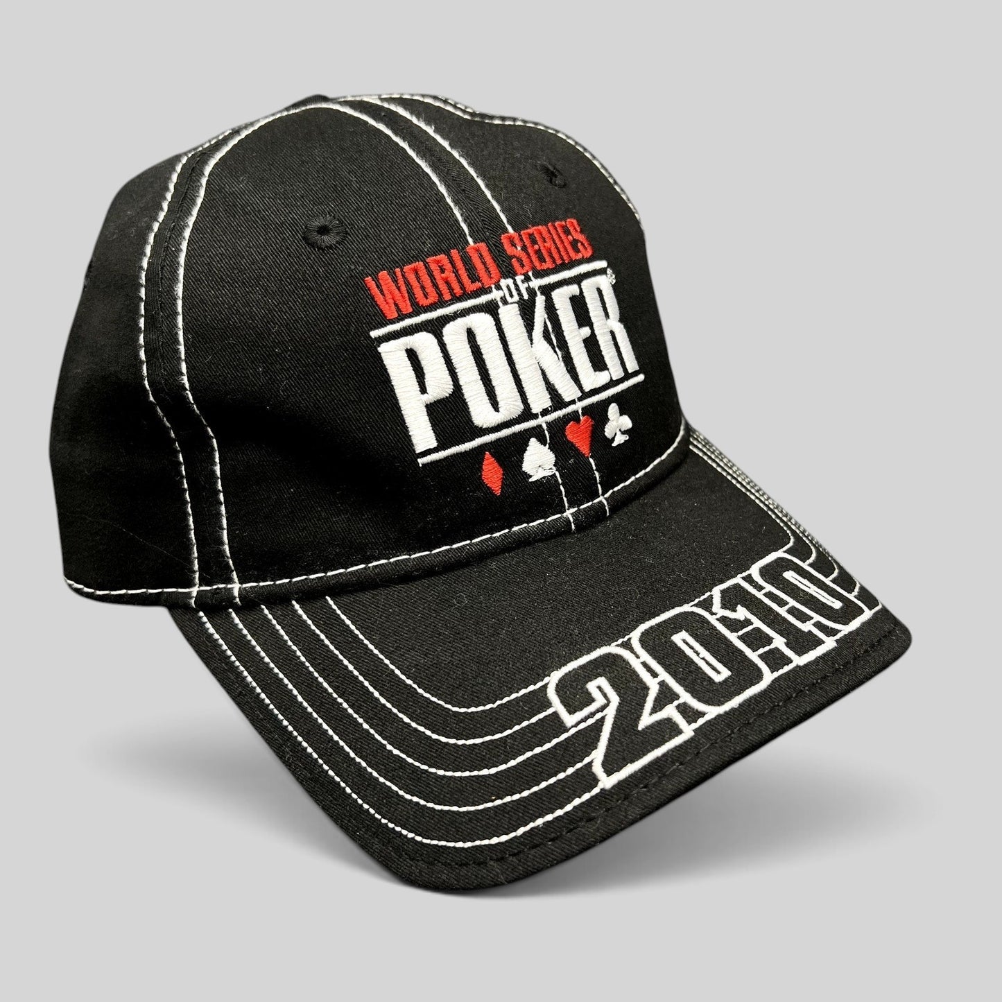 Raree Finds 2010 World Series of Poker black flexfit hat with white contrast stitching and embroidered logo.
