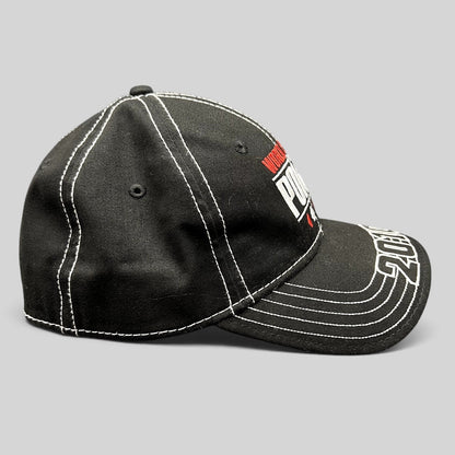 Raree Finds 2010 World Series of Poker black flexfit hat with white contrast stitching and embroidered brim detail.