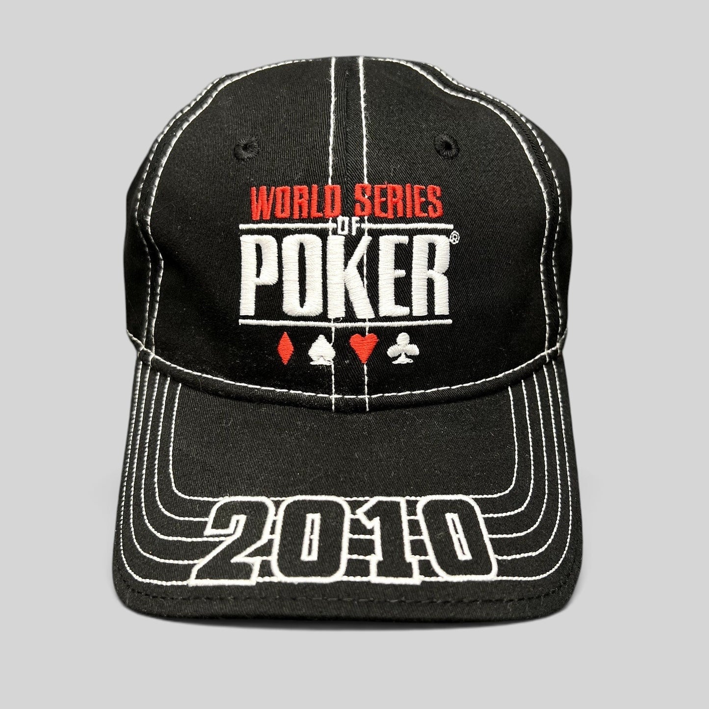 Raree Finds 2010 World Series of Poker black flexfit hat with white embroidered logo and card suit graphics