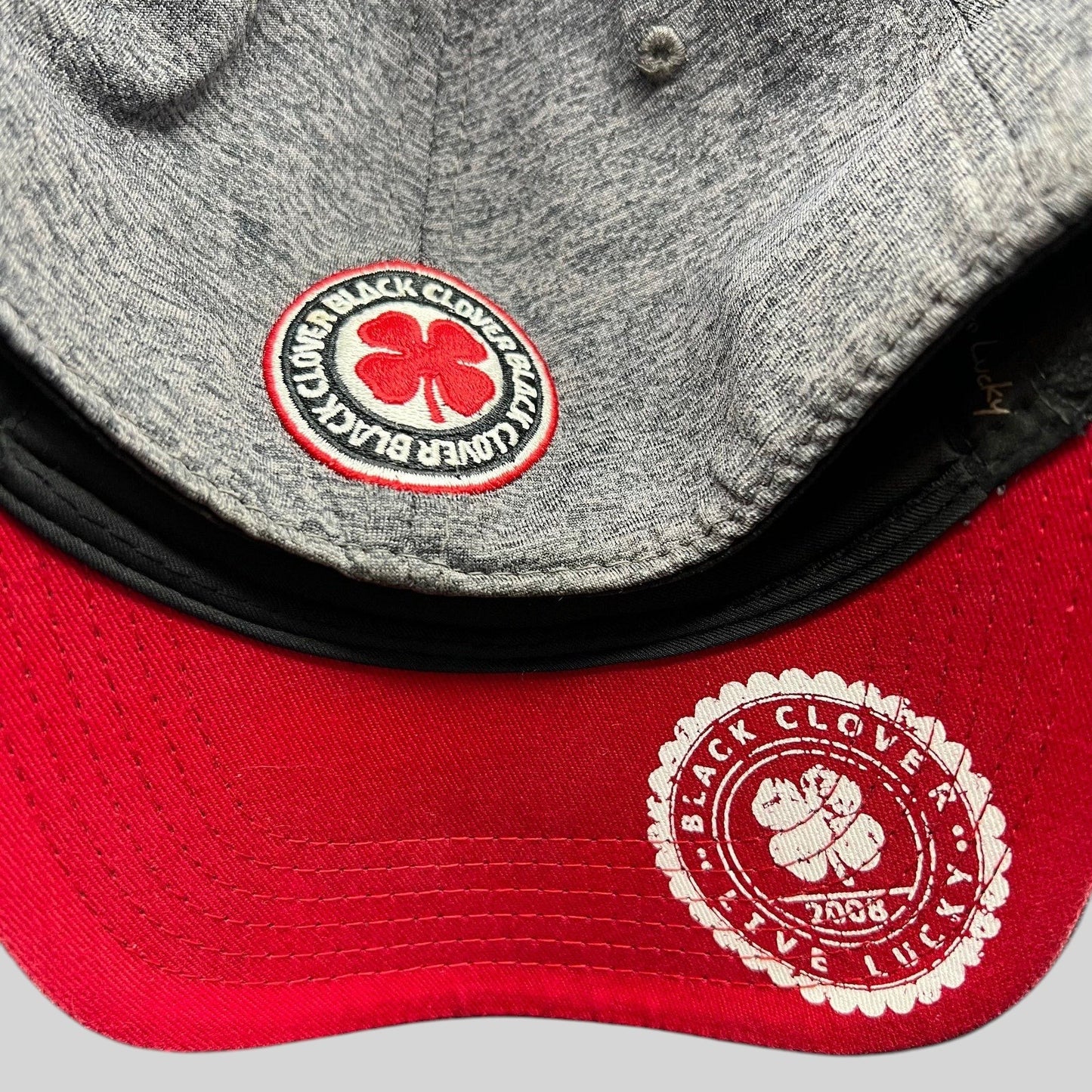 Raree Finds Black Clover heather gray performance cap with red undervisor and California bear clover logo detail