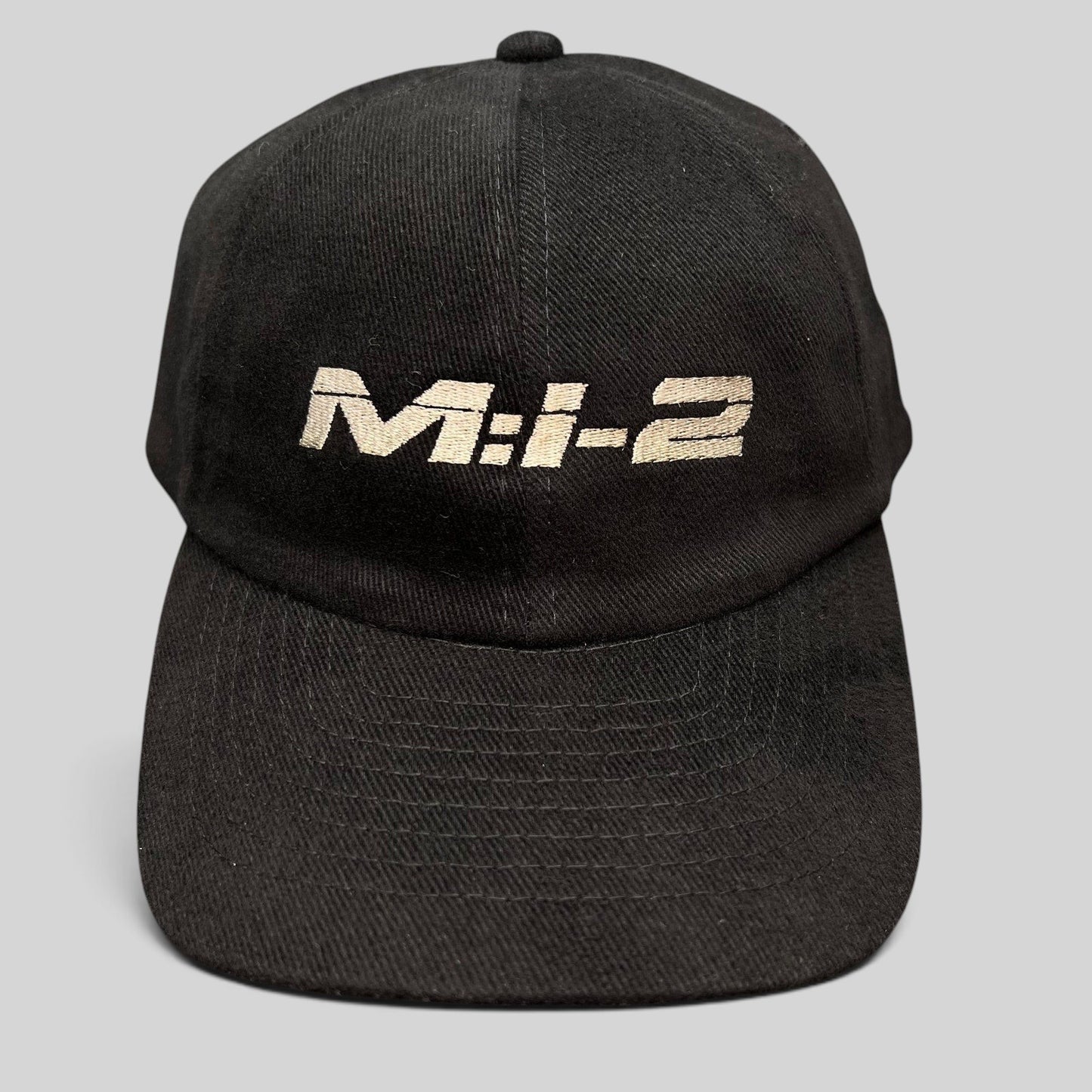 Raree Finds vintage black corduroy snapback hat featuring embroidered M:I-2 Mission Impossible 2 movie logo
