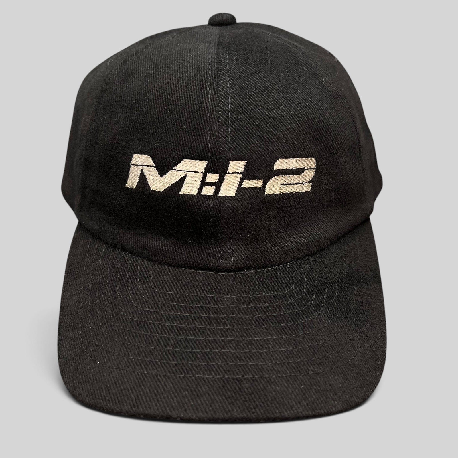 Raree Finds vintage black corduroy snapback hat featuring embroidered M:I-2 Mission Impossible 2 movie logo