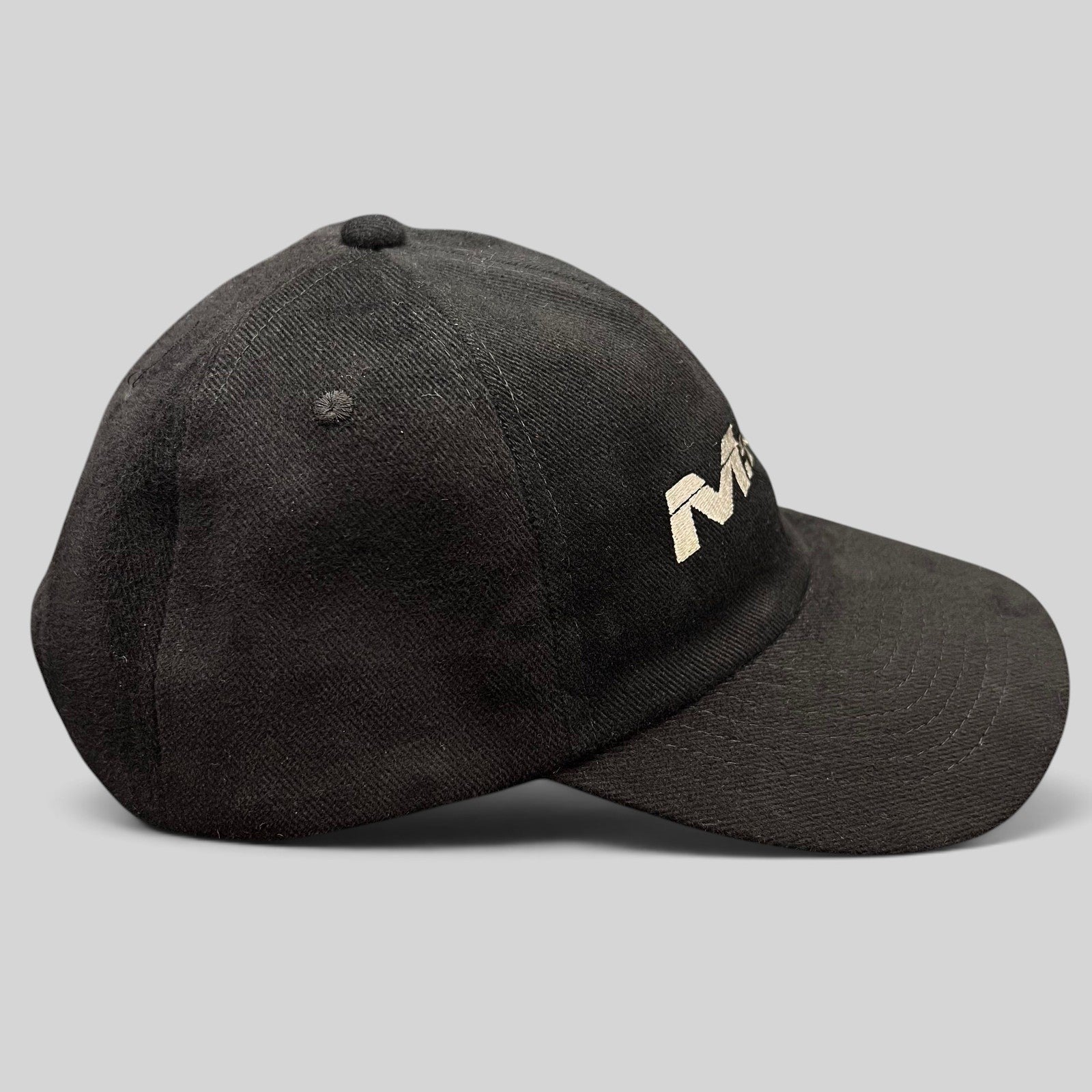 Raree Finds vintage black corduroy snapback hat featuring embroidered M:I-2 movie logo from the year 2000