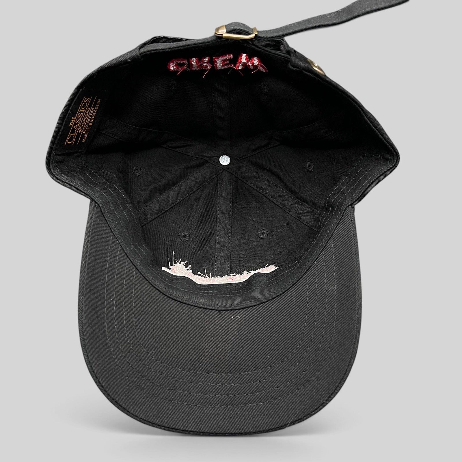 Raree Finds black cotton Looney Tunes crew strapback hat with brass buckle and interior Yupoong branding
