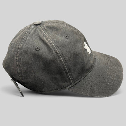 Raree Finds black cotton strapback hat with a minimalist metal Playboy bunny logo on the front crown