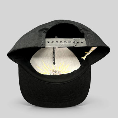 Raree Finds black snapback hat featuring an adjustable plastic closure and interior Tasmanian Devil embroidery.