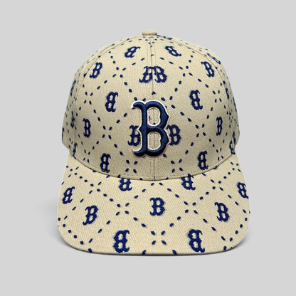 Raree Finds MLB Korea Boston Red Sox strapback hat in beige canvas with a blue monogram B pattern and raised logo.