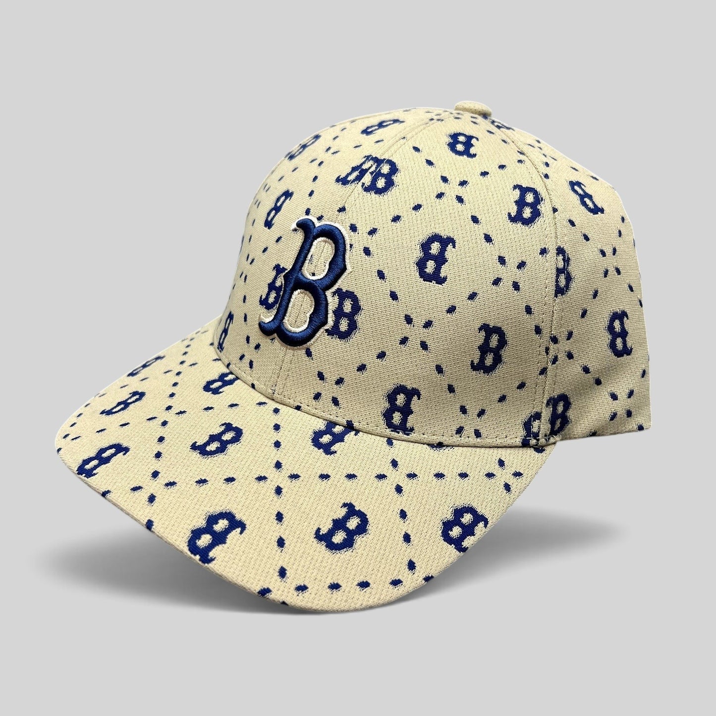 Raree Finds MLB Korea Boston Red Sox strapback hat in beige with a blue monogram B pattern and raised front logo.