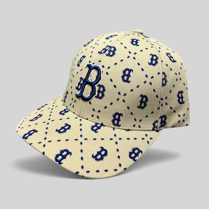 Raree Finds MLB Korea Boston Red Sox strapback hat in beige with a blue monogram B pattern and raised front logo.