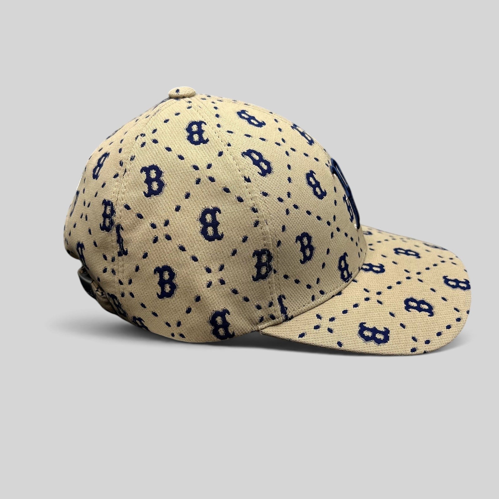 Raree Finds MLB Korea Boston Red Sox strapback hat in beige canvas with a blue monogram B pattern and curved brim.
