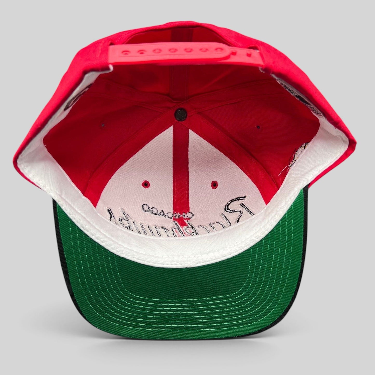 Raree Finds vintage 90s Chicago Blackhawks snapback hat interior showing green under-visor and adjustable strap