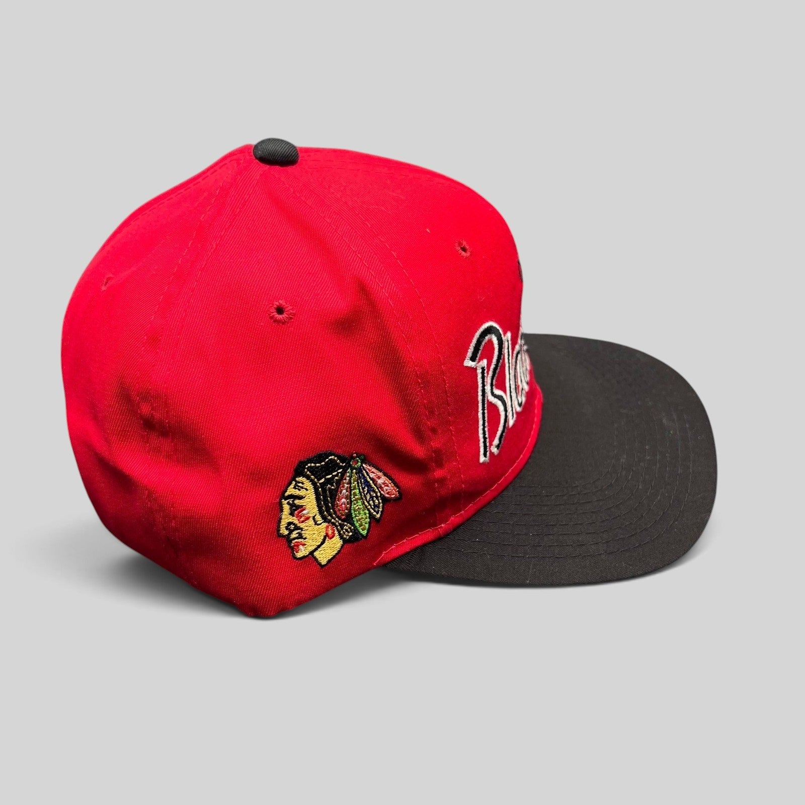 Raree Finds vintage 90s Chicago Blackhawks Sports Specialties snapback hat with red crown, black brim, and script logo