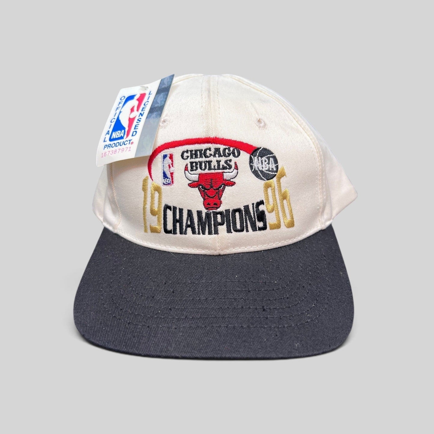 Raree Finds vintage 1996 Chicago Bulls NBA Champions snapback hat with cream crown, black brim, and embroidered logo.