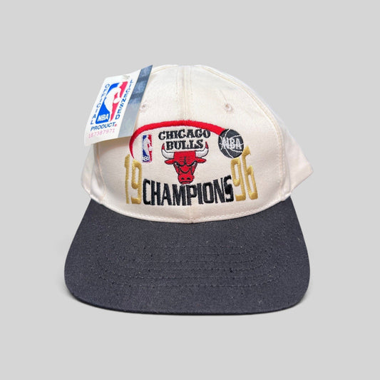 Raree Finds vintage 1996 Chicago Bulls NBA Champions snapback hat with cream crown, black brim, and embroidered logo.