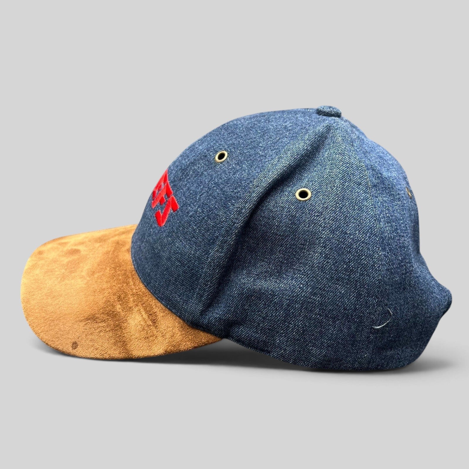 Raree Finds vintage Kansas City Chiefs Annco snapback hat with blue denim crown, brown suede bill, and red embroidery.