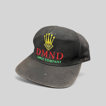 Raree Finds vintage Diamond Supply Co. black snapback hat with red, yellow, and green crown and diamond embroidery.