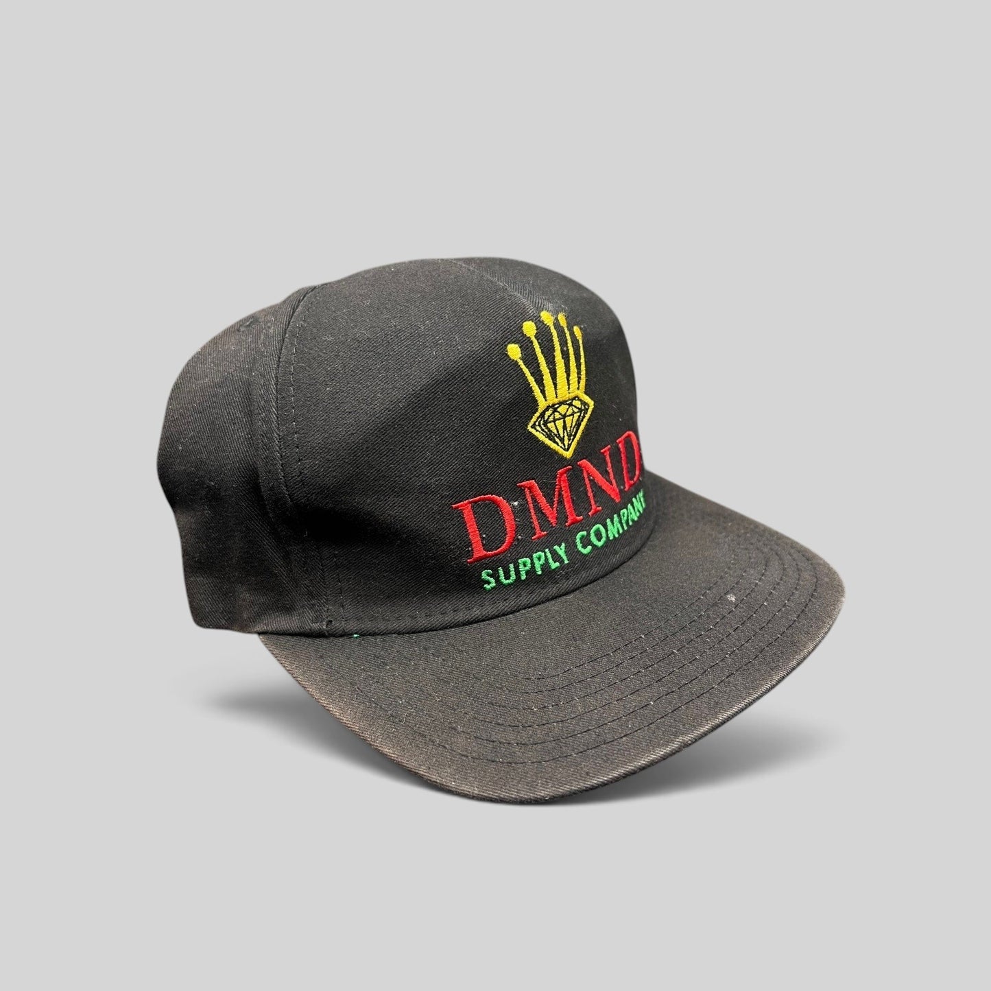 Raree Finds vintage Diamond Supply Co. black snapback hat with red, yellow, and green crown and diamond logo embroidery