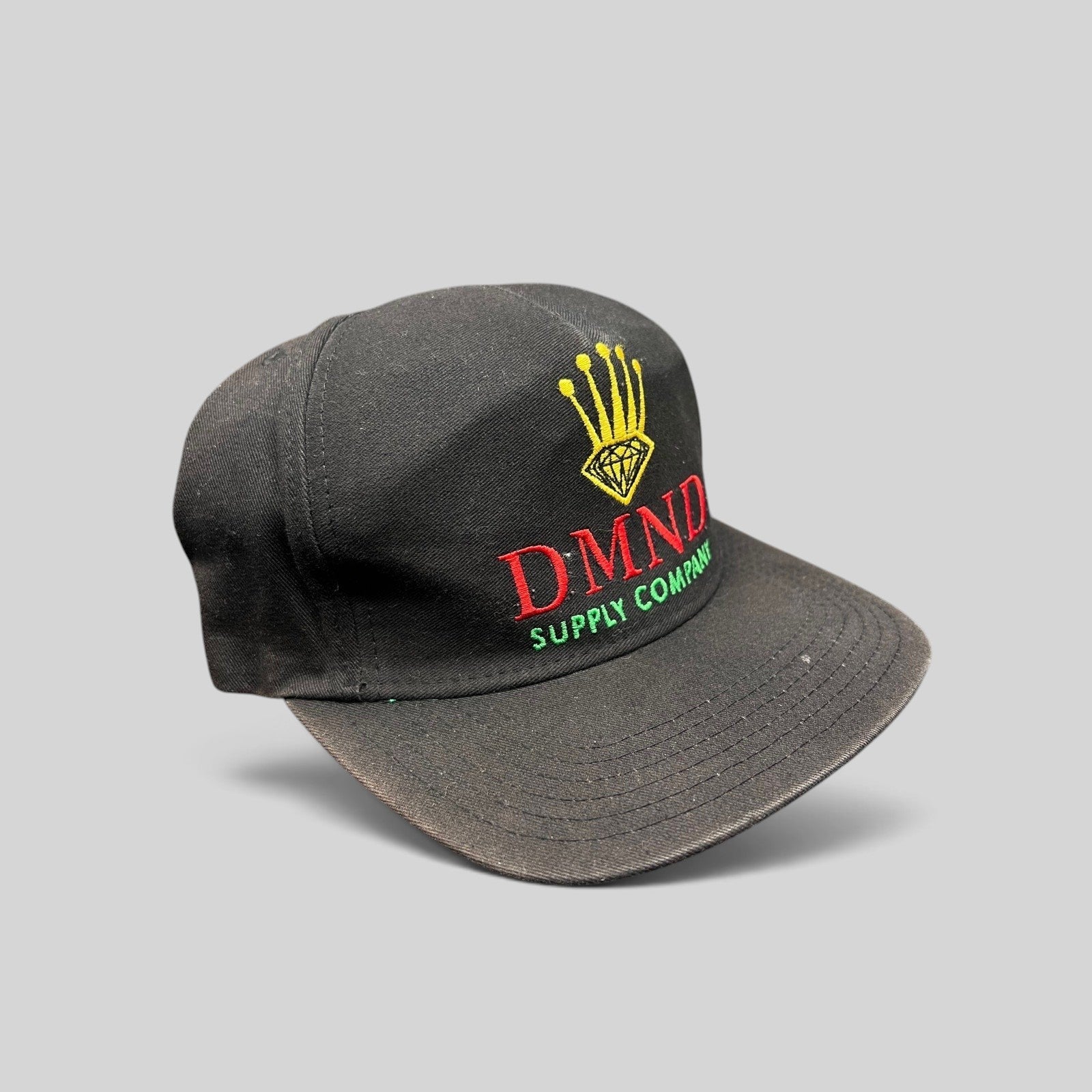 Raree Finds vintage Diamond Supply Co. black snapback hat with red, yellow, and green crown and diamond logo embroidery