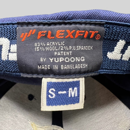 Raree Finds X-Men First Class crew hat interior label showing Flexfit by Yupoong branding and size S/M tag