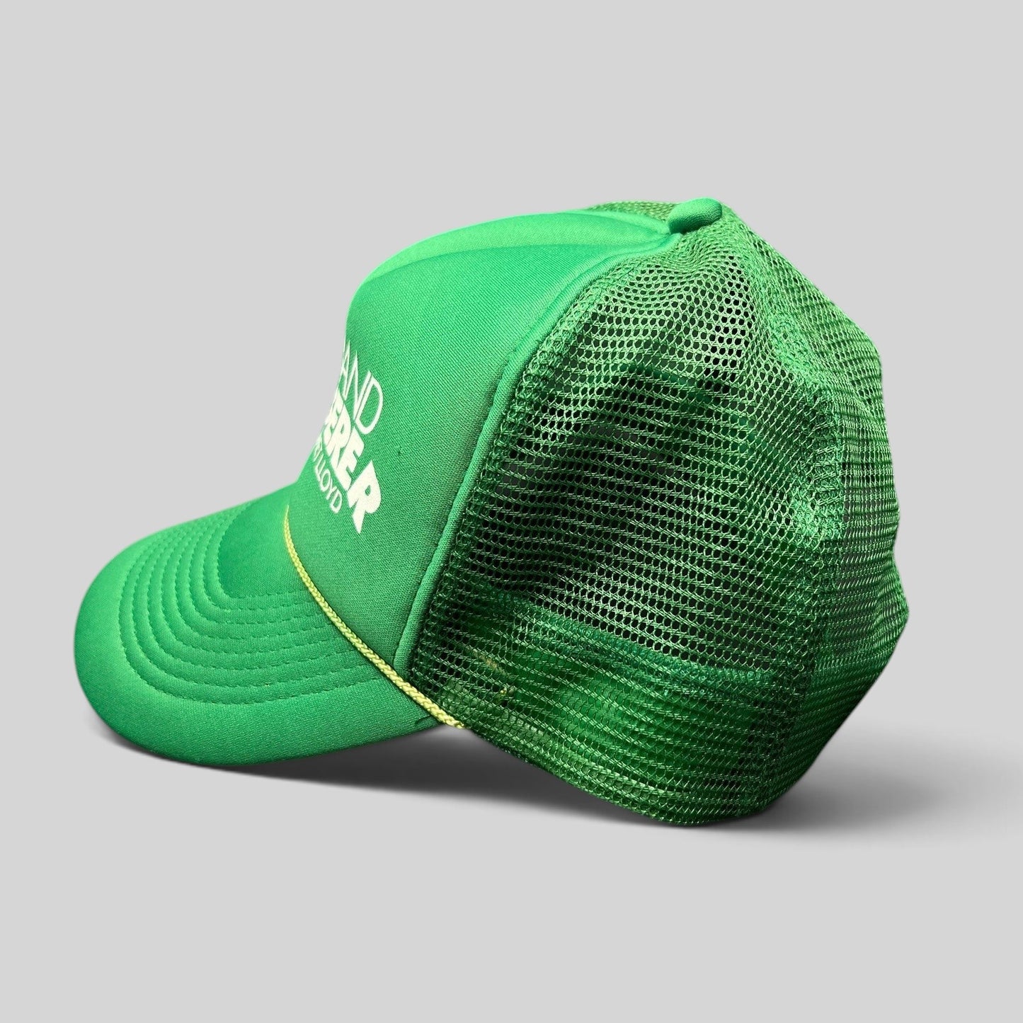 Raree Finds vintage green Otto Cap trucker hat with Dumb and Dumberer movie promo print and rope brim detail