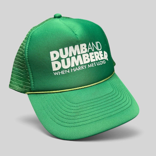 Raree Finds vintage green foam trucker hat with white Dumb and Dumberer movie promo print and rope brim detail