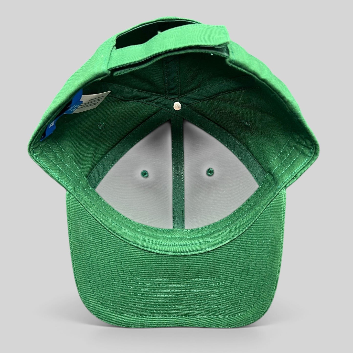 Raree Finds Prince Pickleball green strapback hat showing the interior construction and adjustable back strap