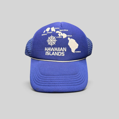 Raree Finds vintage royal blue foam trucker hat with a white Hawaiian Islands map graphic and nautical helm emblem.