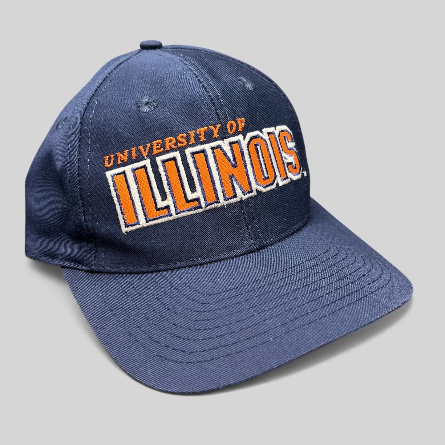 Raree Finds vintage University of Illinois Sports Specialties navy cotton snapback hat with orange embroidered logo