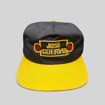 Raree Finds vintage Jose Cuervo snapback hat with black crown, gold brim, and embroidered logo in gold and red.