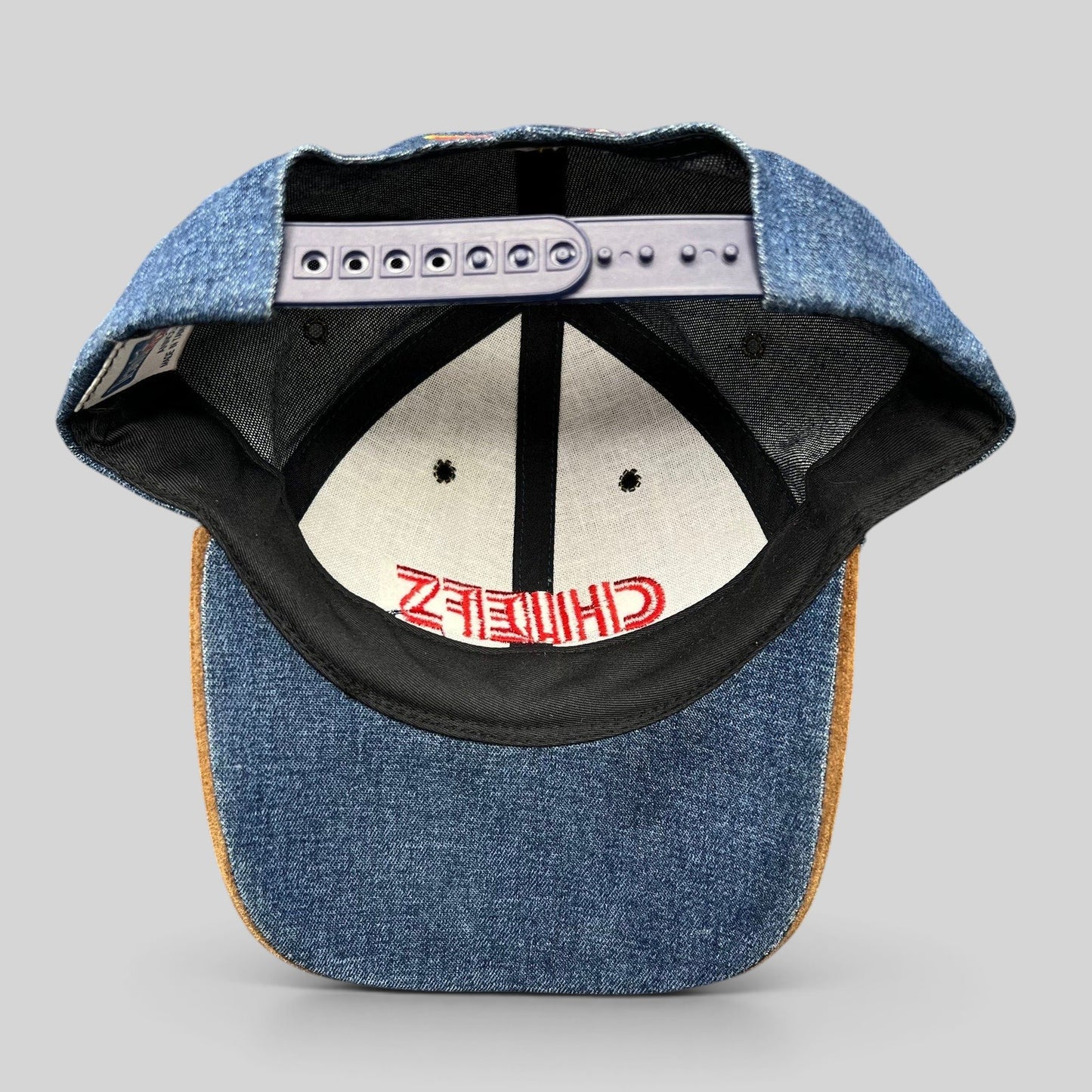 Raree Finds vintage Kansas City Chiefs Annco snapback hat showing the interior denim crown and plastic snap closure